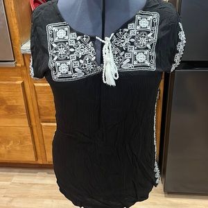 Beautiful black top with lace. Sold by Maurices. Extra large